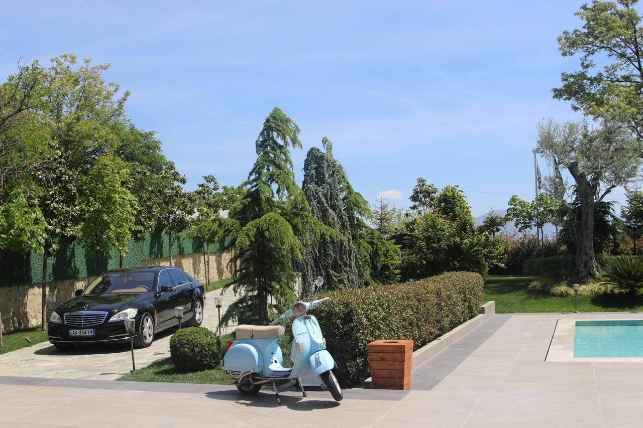 Pool area and villa exterior